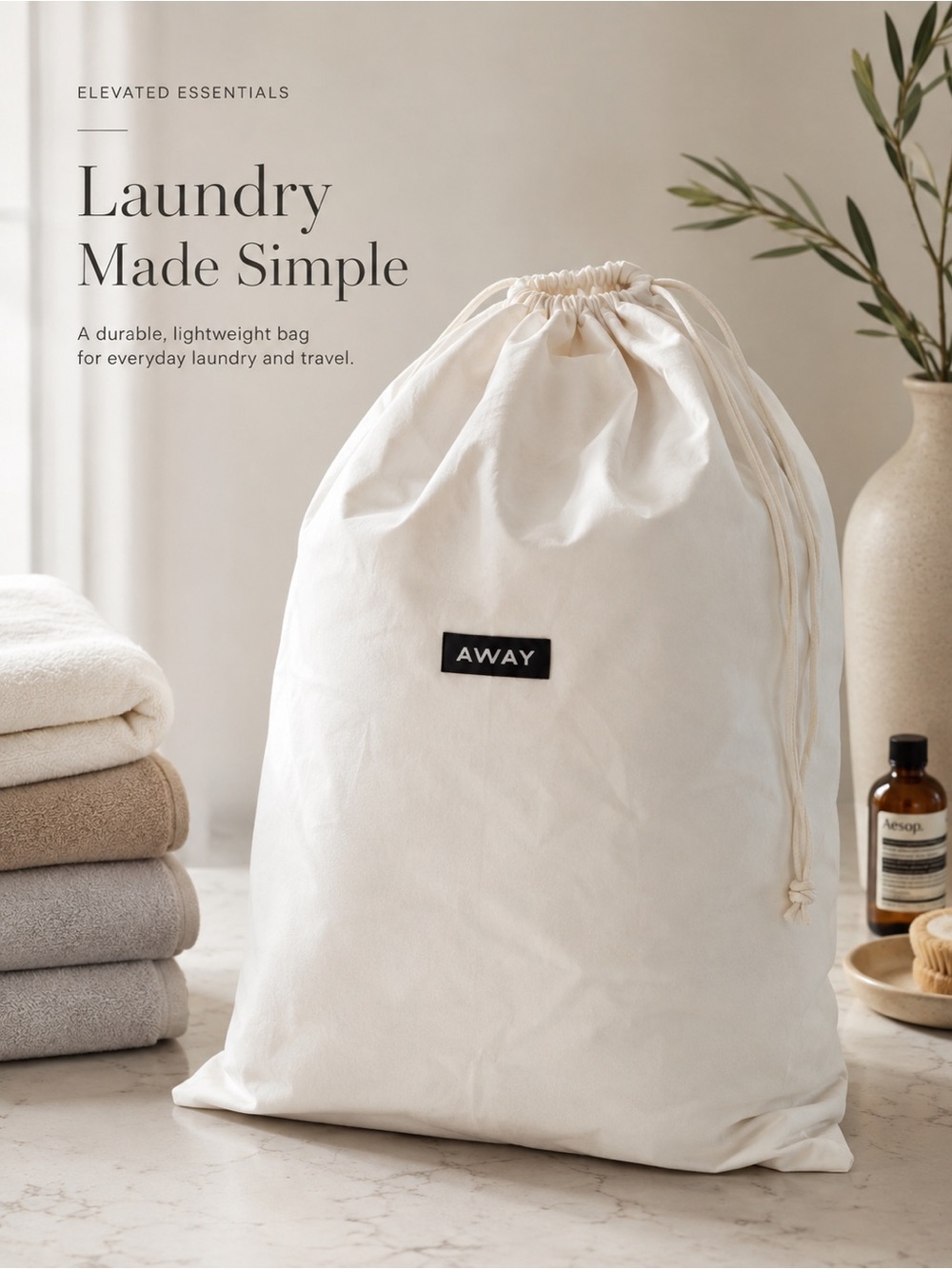 Away Canvas Travel Laundry Bag - Cream with Black Logo